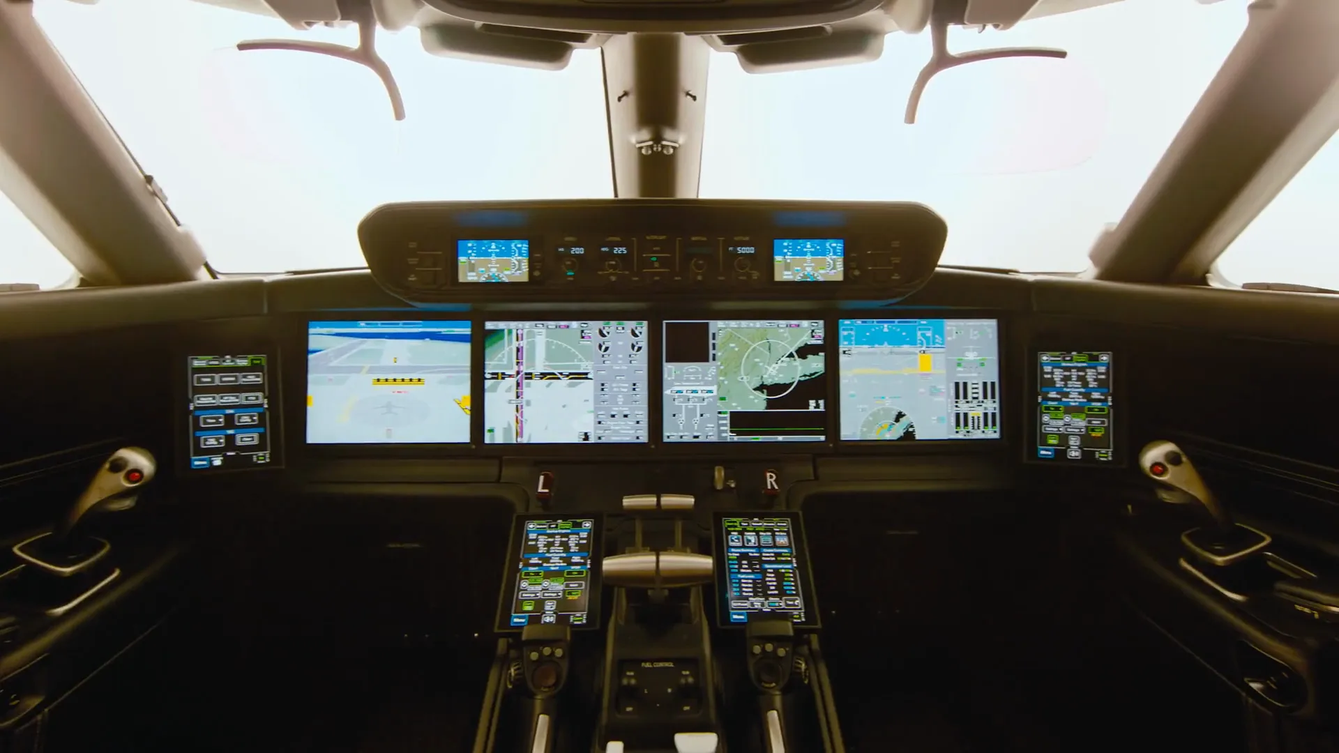 Business jet flight deck at night