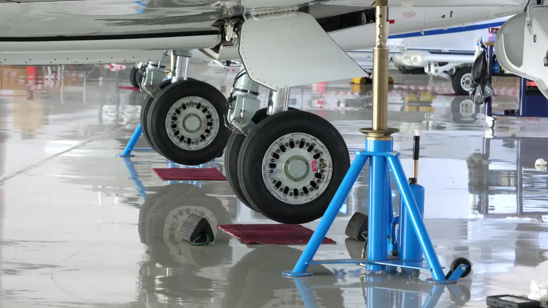 Business jet in a hangar during an inspection